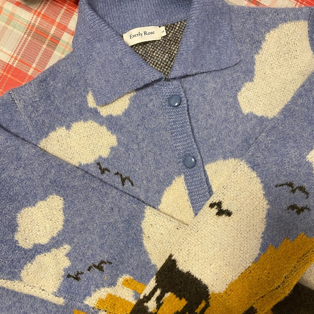 Warm cardigan sweater with western desert design